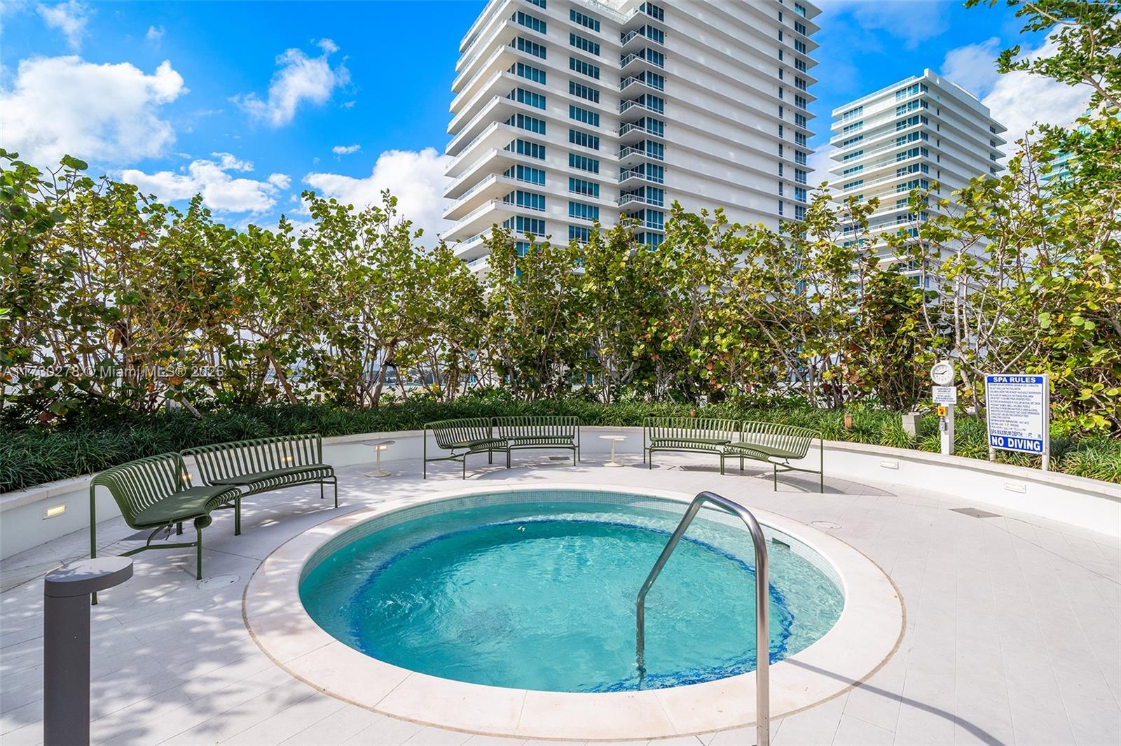 500 Alton Road, Unit 3101 Miami Beach, FL 33139 - Photo 53 of 53 a view of a swimming pool with a patio