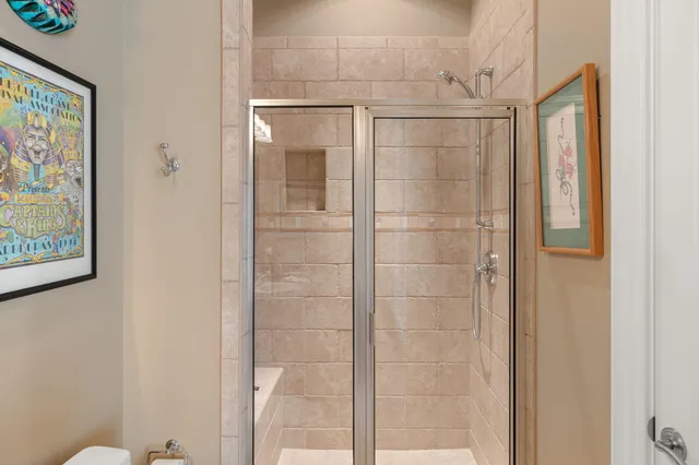 a bathroom with a sink double vanity and a mirror