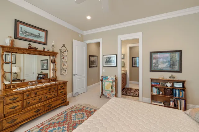 a utility room with cabinets washer and dryer