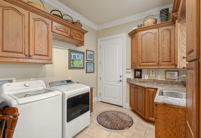 a stove top oven sitting inside of a kitchen