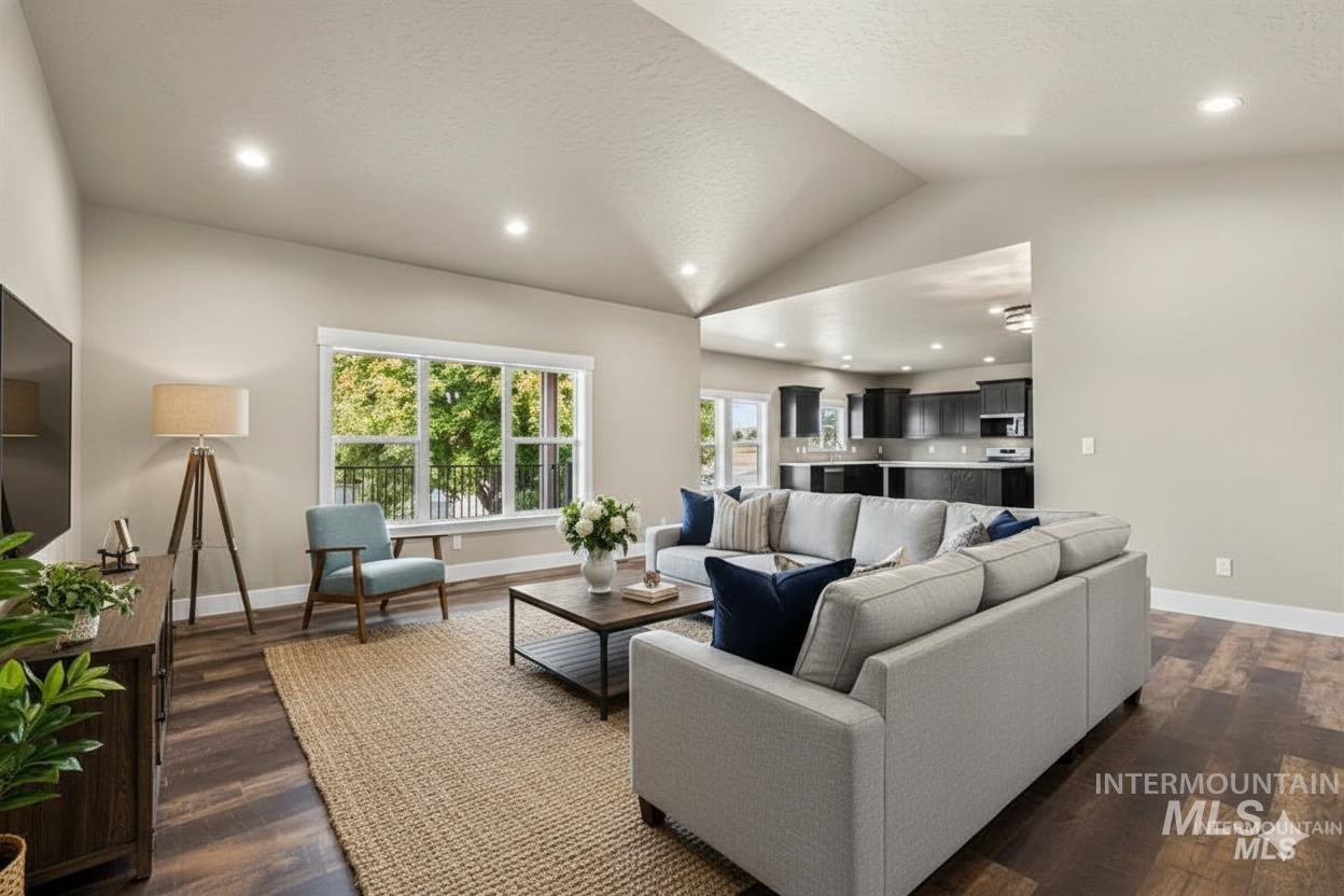 2755 Cypress Point Payette, ID 83661 - Photo 4 of 28 Living area with dark wood-style floors and recessed lighting