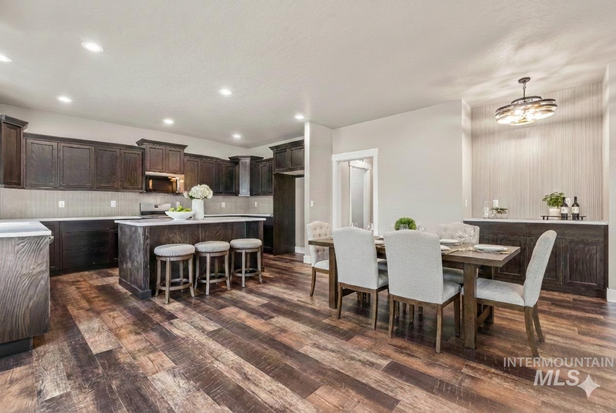 2755 Cypress Point Payette, ID 83661 - Photo 5 of 28 Dining room featuring dark wood-type flooring and recessed lighting