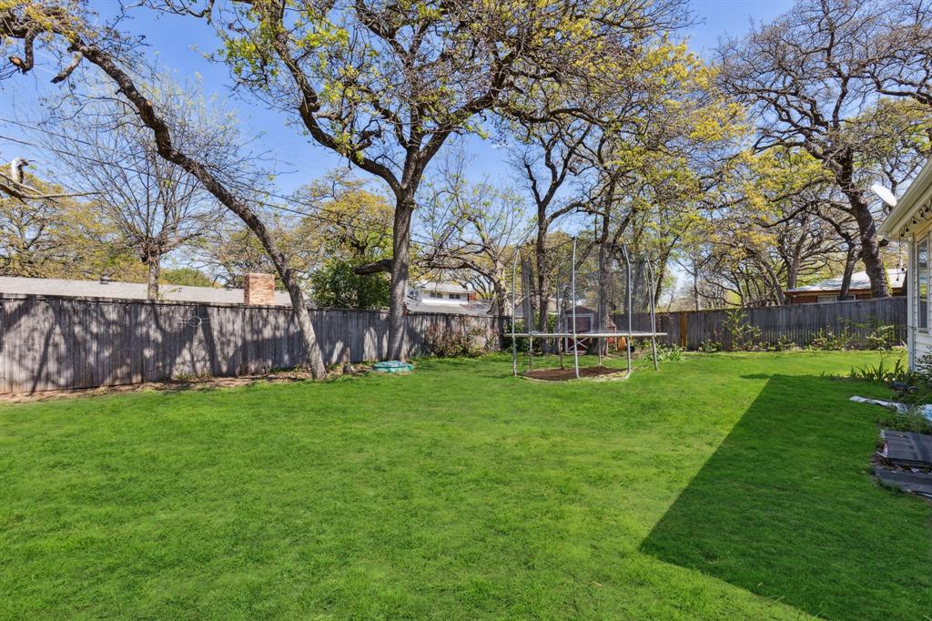 724 Edgehill Drive Hurst, TX 76053 - Photo 25 of 27 a garden view