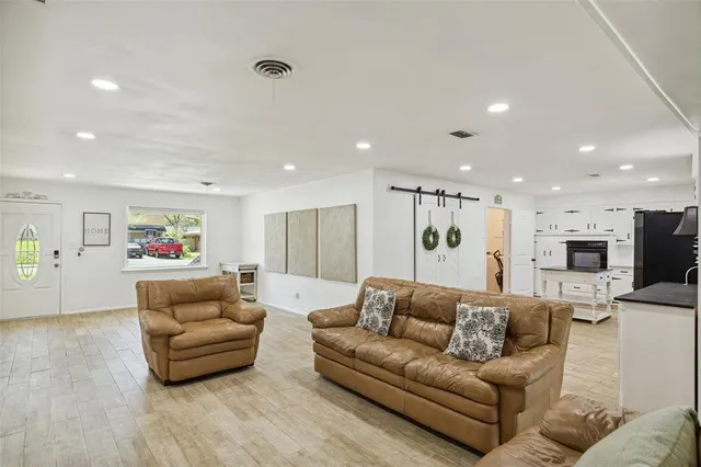 a living room with furniture and a couch