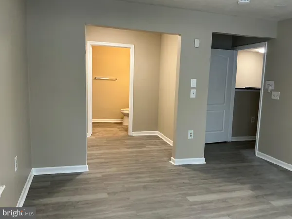 a view of livingroom with wooden floor