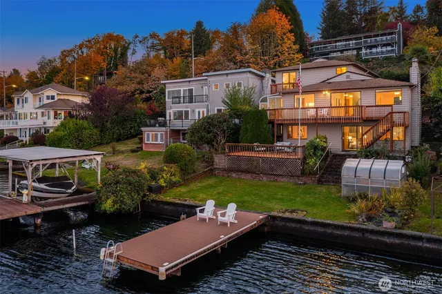 a backyard of a house with yard and outdoor seating