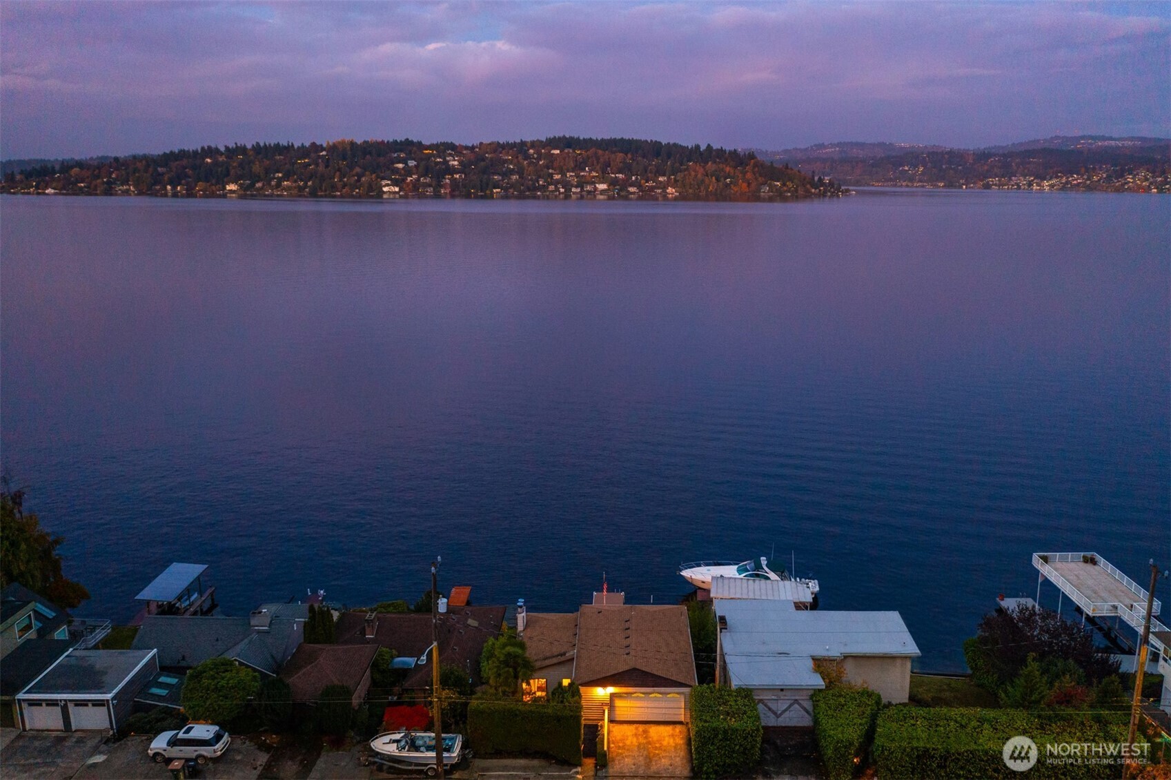 9764 Rainier Avenue South Seattle, WA 98118 - Photo 30 of 40 a view of a lake and a mountain view
