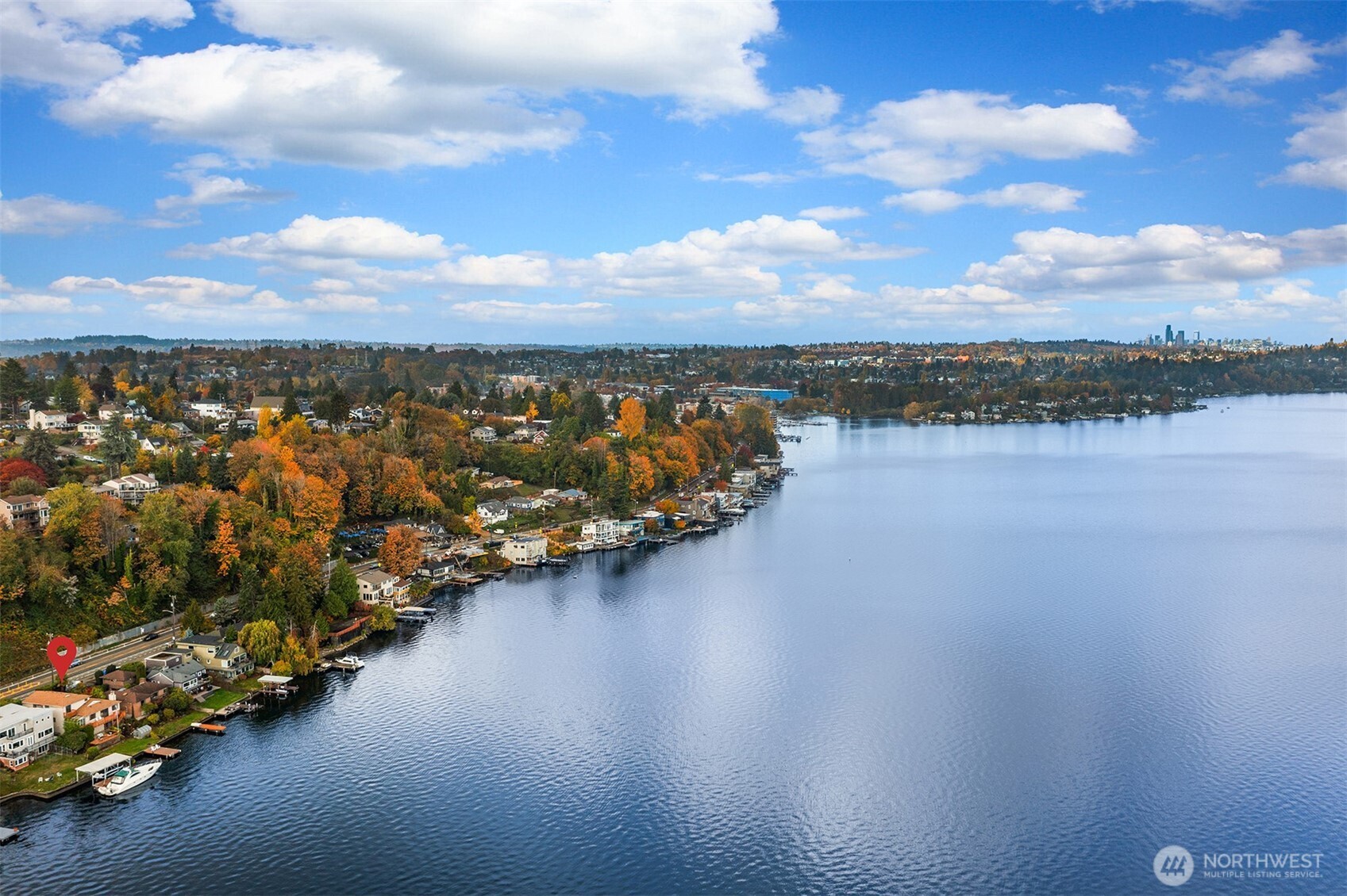 9764 Rainier Avenue South Seattle, WA 98118 - Photo 37 of 40 a view of a lake with a city