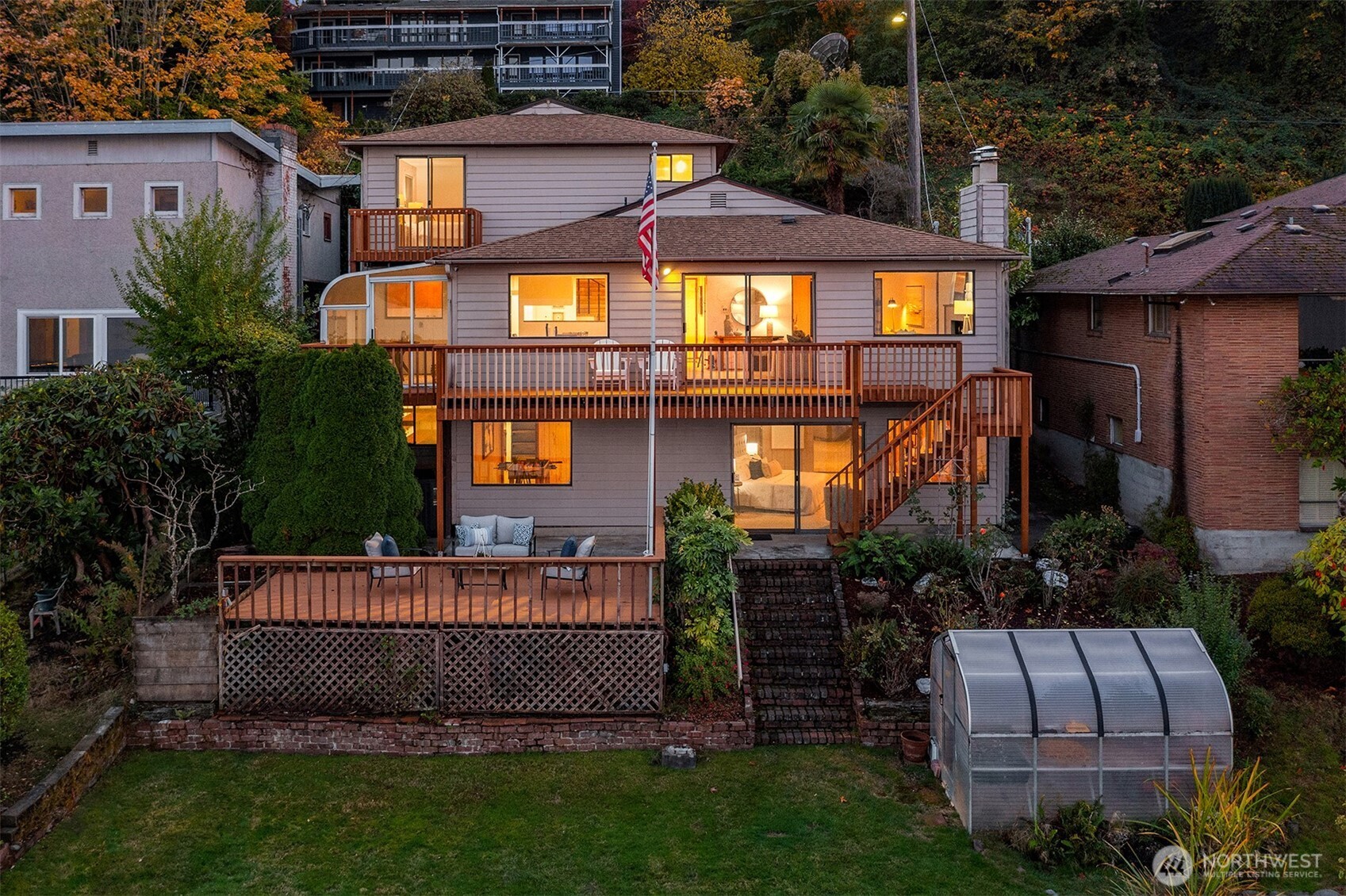 9764 Rainier Avenue South Seattle, WA 98118 - Photo 39 of 40 a front view of a house with a garden
