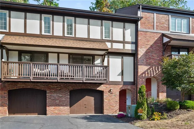 a front view of a house with a porch