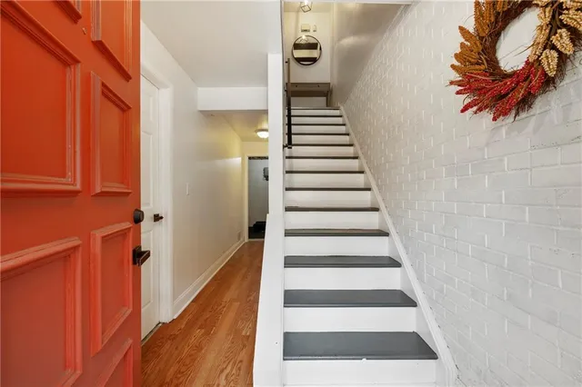 a view of entryway with wooden floor