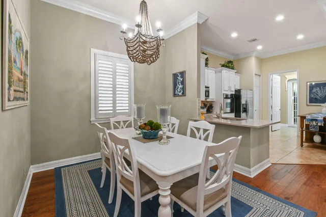 a spacious bathroom with a double vanity sink a large mirror and a shower