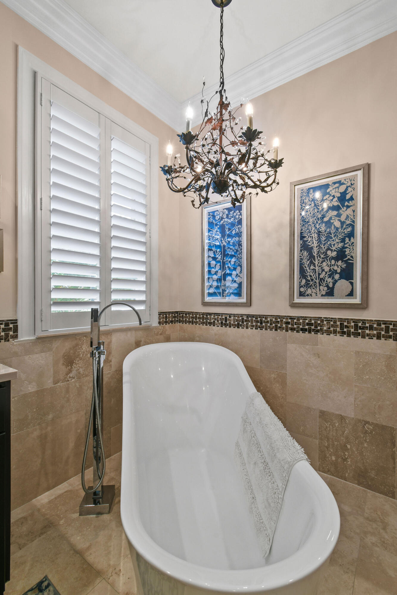 167 Arklow Avenue Jupiter, FL 33458 - Photo 25 of 60 a view of a chandelier in a room