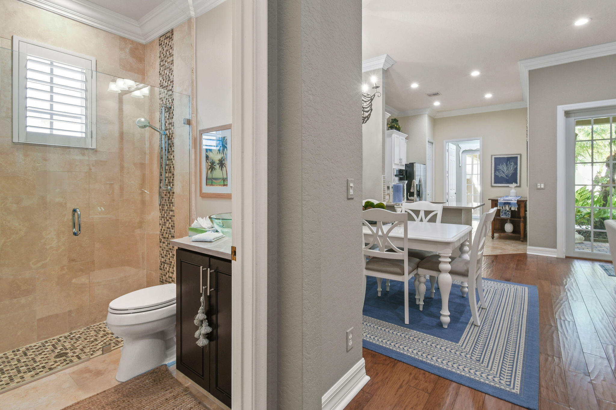 167 Arklow Avenue Jupiter, FL 33458 - Photo 35 of 60 a dining room with furniture and wooden floor