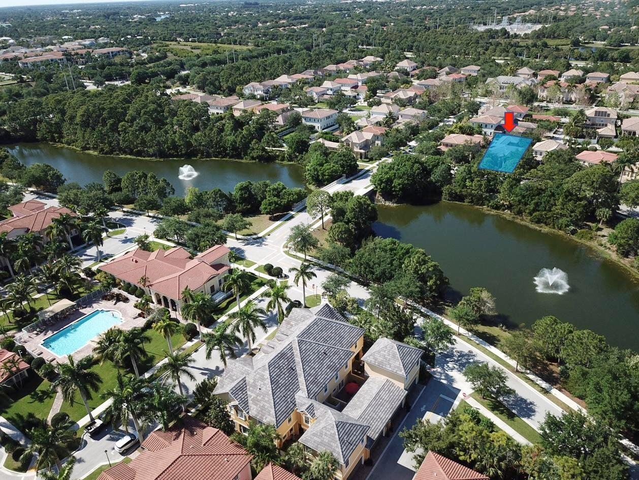 167 Arklow Avenue Jupiter, FL 33458 - Photo 47 of 60 an aerial view of residential house with outdoor space and lake view