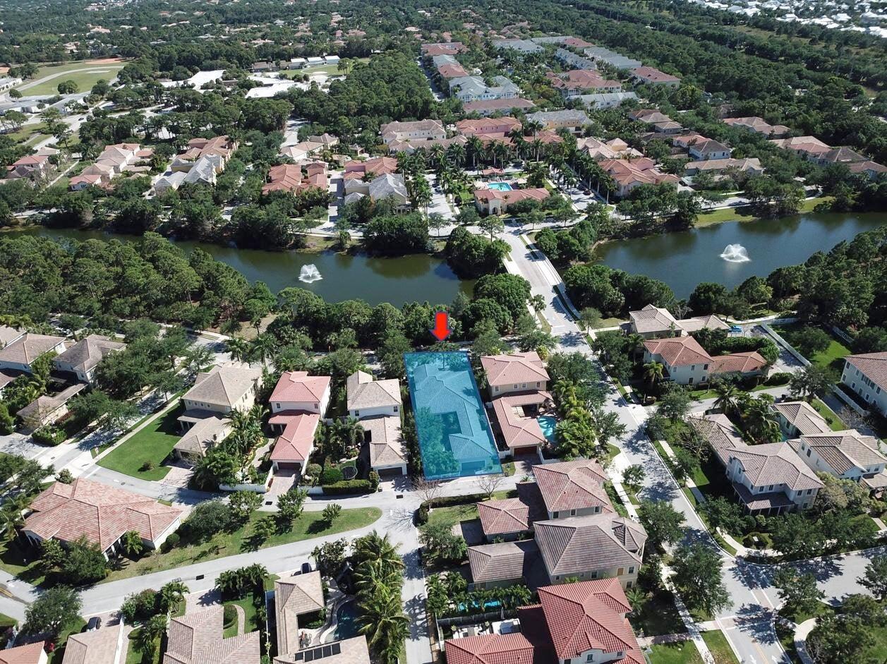 167 Arklow Avenue Jupiter, FL 33458 - Photo 48 of 60 an aerial view of residential houses with outdoor space and lake view