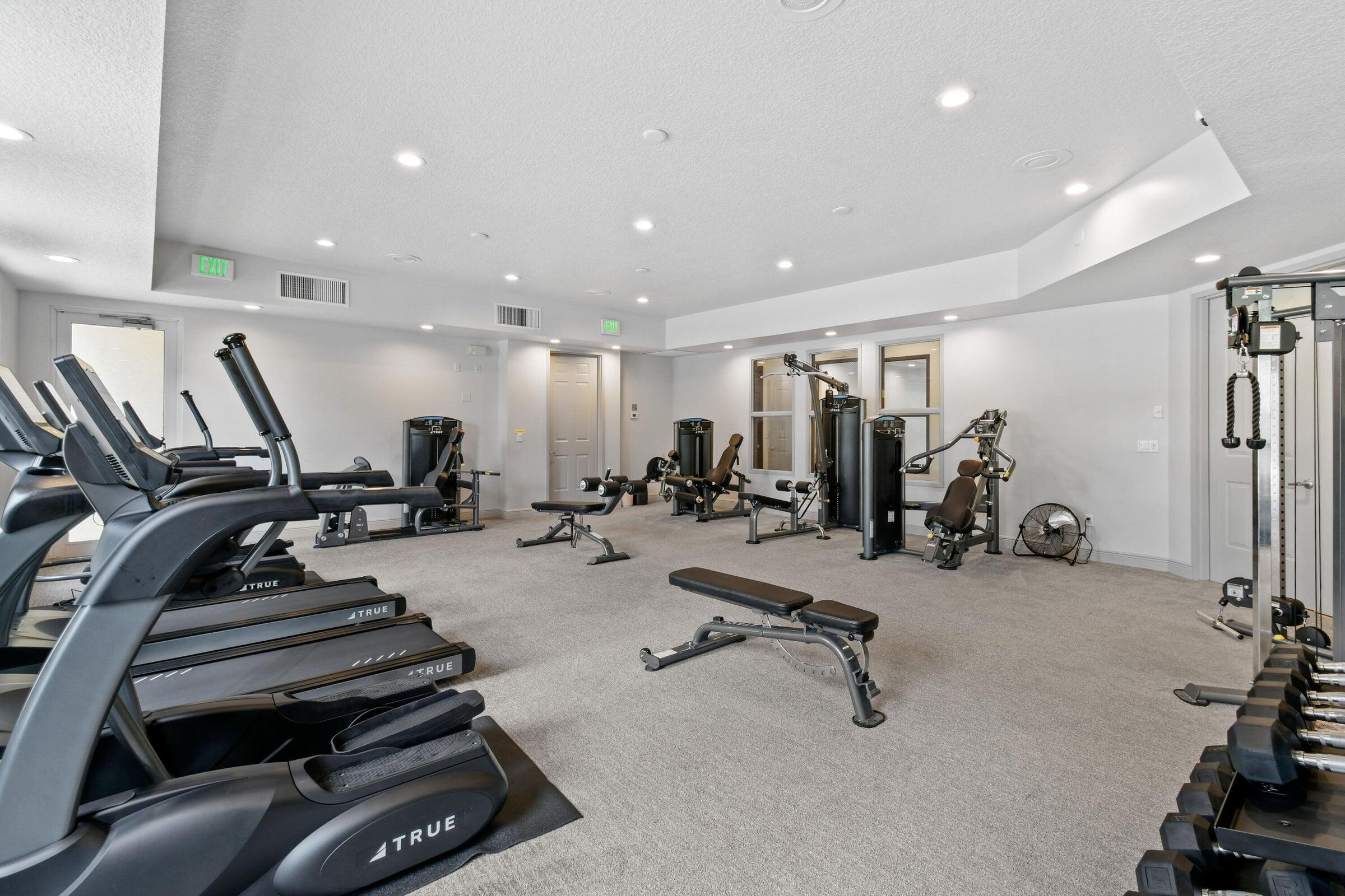 167 Arklow Avenue Jupiter, FL 33458 - Photo 54 of 60 a view of a room with gym equipment