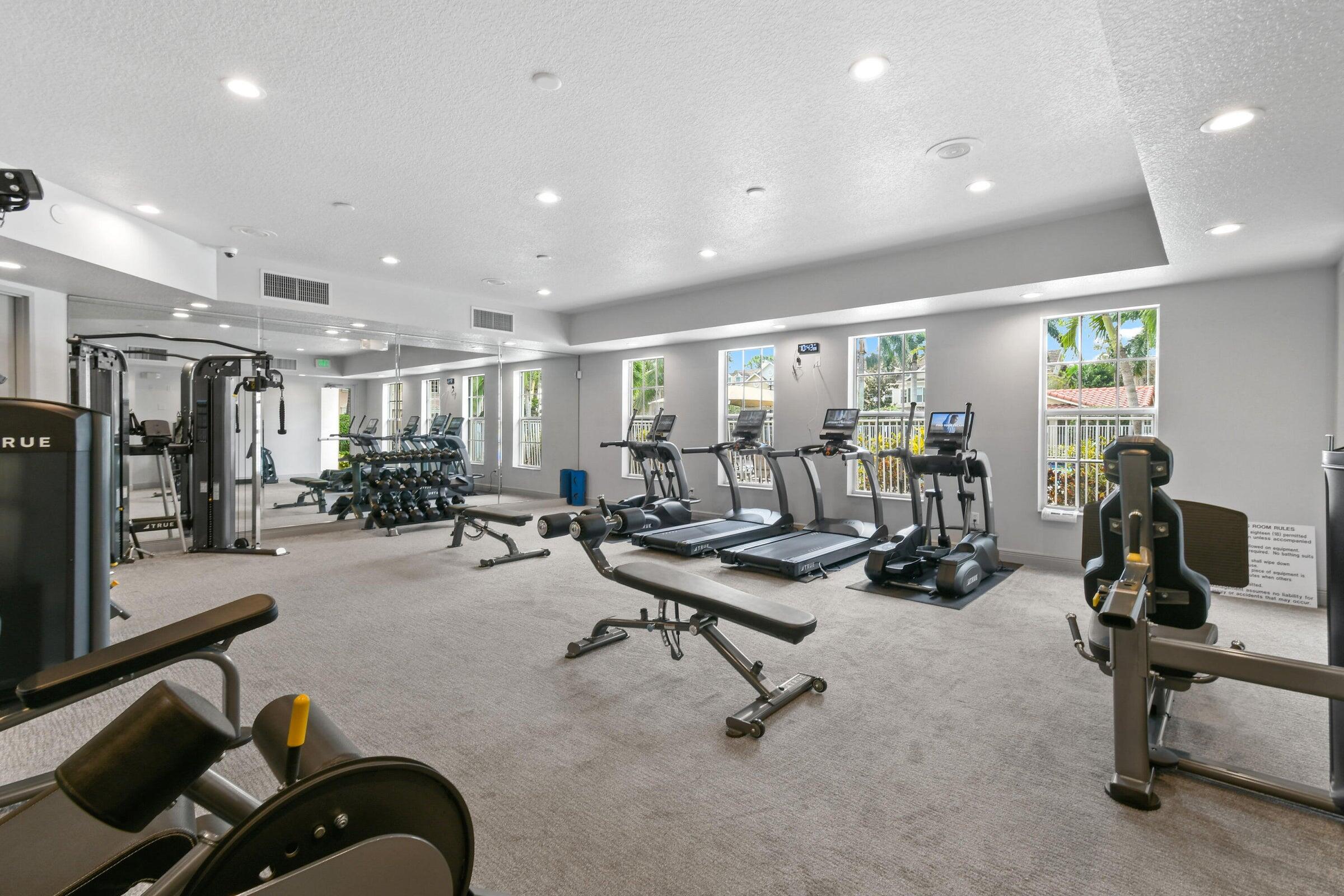 167 Arklow Avenue Jupiter, FL 33458 - Photo 55 of 60 a view of a room with gym equipment