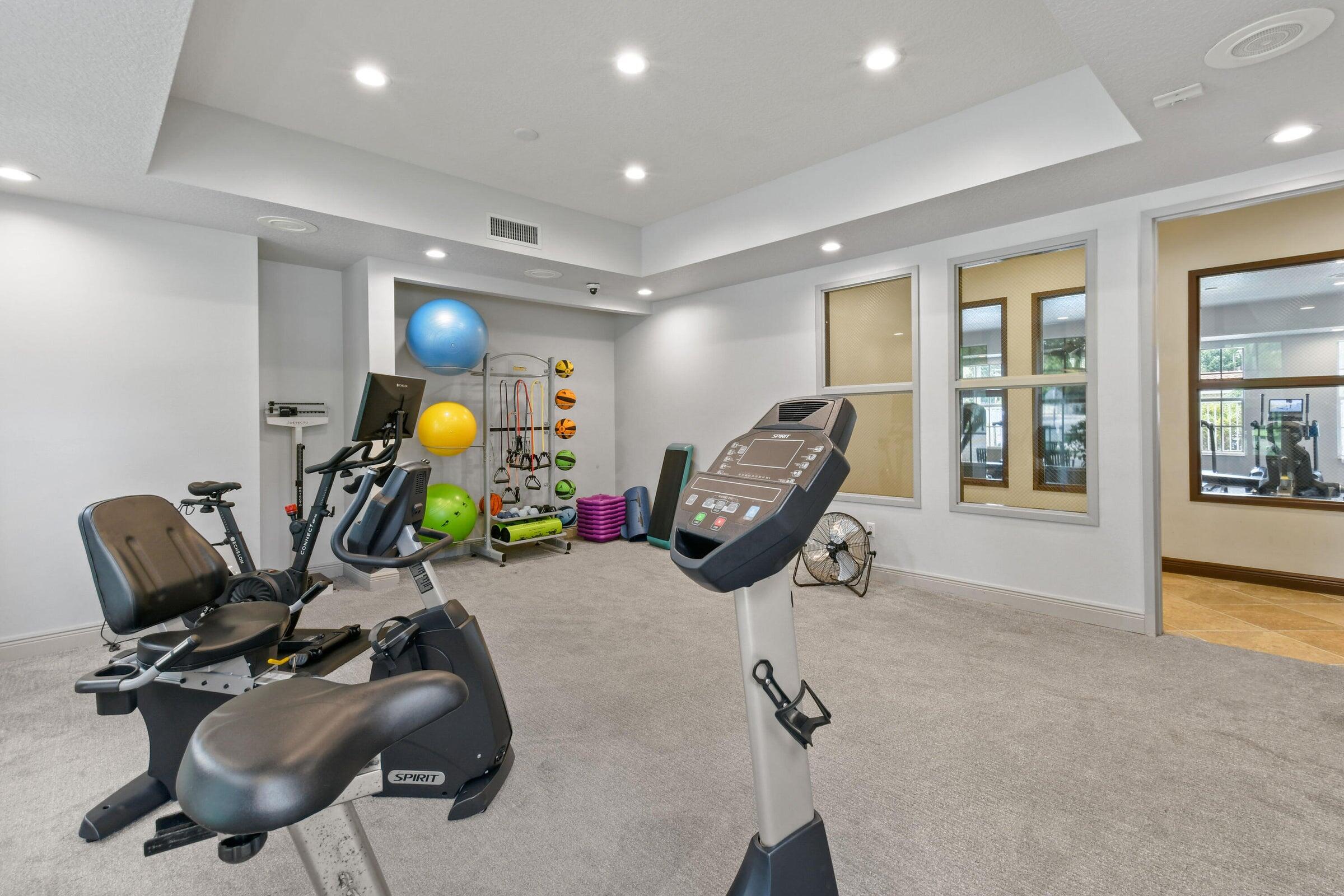 167 Arklow Avenue Jupiter, FL 33458 - Photo 57 of 60 a view of a room with gym equipment