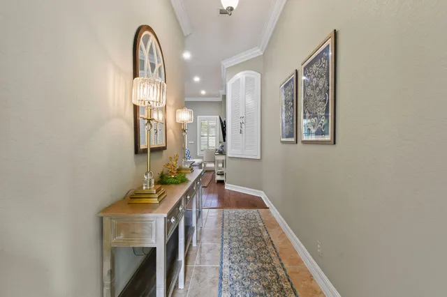 a kitchen with granite countertop a sink stainless steel appliances and cabinets