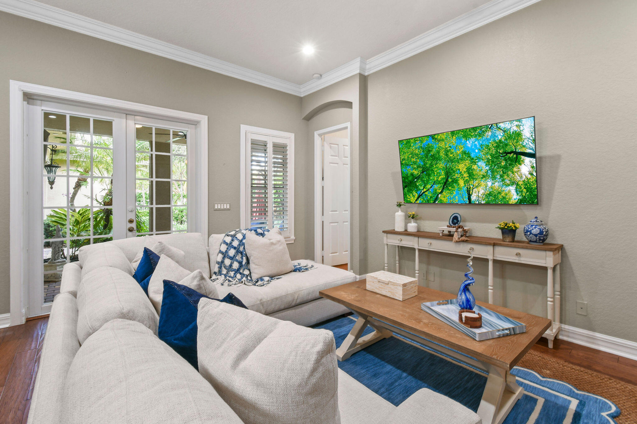 167 Arklow Avenue Jupiter, FL 33458 - Photo 9 of 60 a living room with furniture and a flat screen tv
