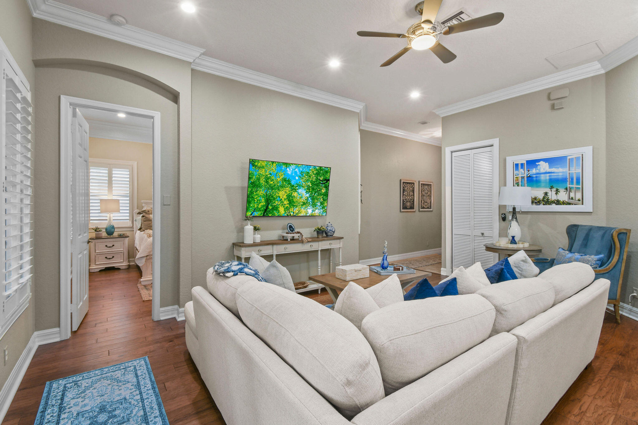167 Arklow Avenue Jupiter, FL 33458 - Photo 10 of 60 a living room with furniture and a flat screen tv