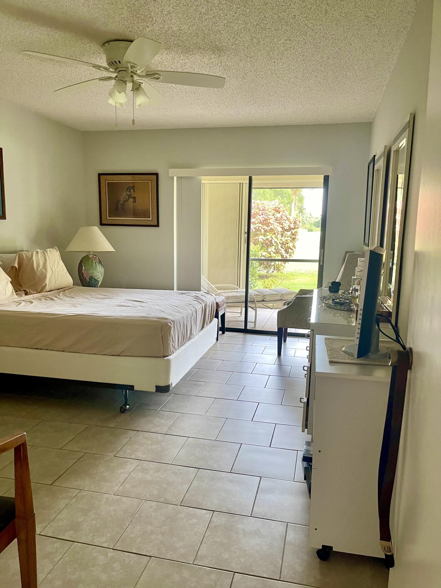 1501 Pinecrest Circle, Unit E Jupiter, FL 33458 - Photo 14 of 25 Master BR w/ensuite bathroom