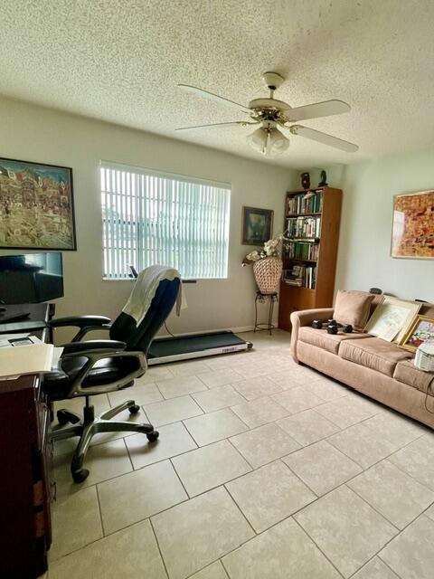 1501 Pinecrest Circle, Unit E Jupiter, FL 33458 - Photo 15 of 25 Guest bedroom w/walk in closet