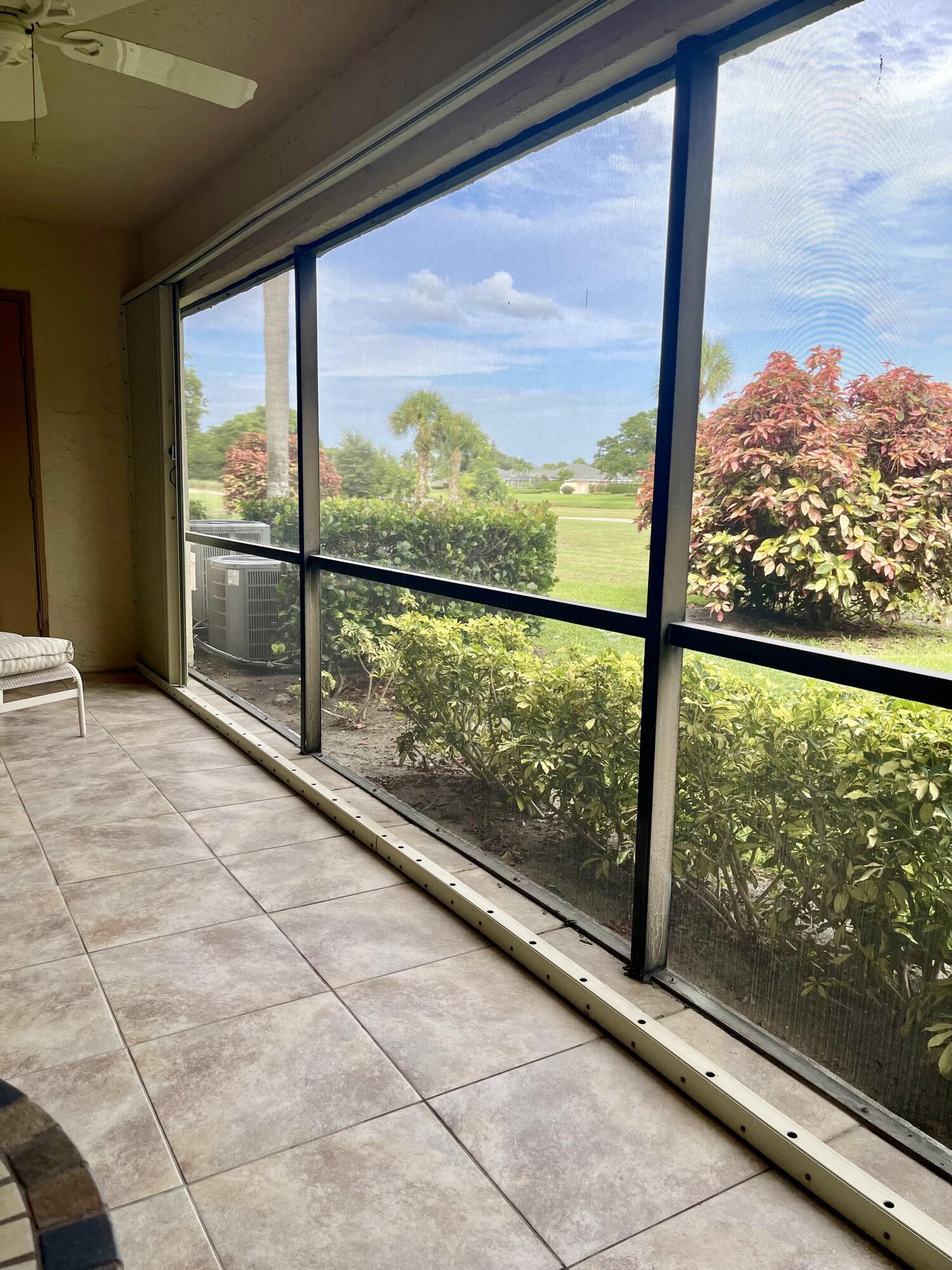 1501 Pinecrest Circle, Unit E Jupiter, FL 33458 - Photo 17 of 25 Large screened patio