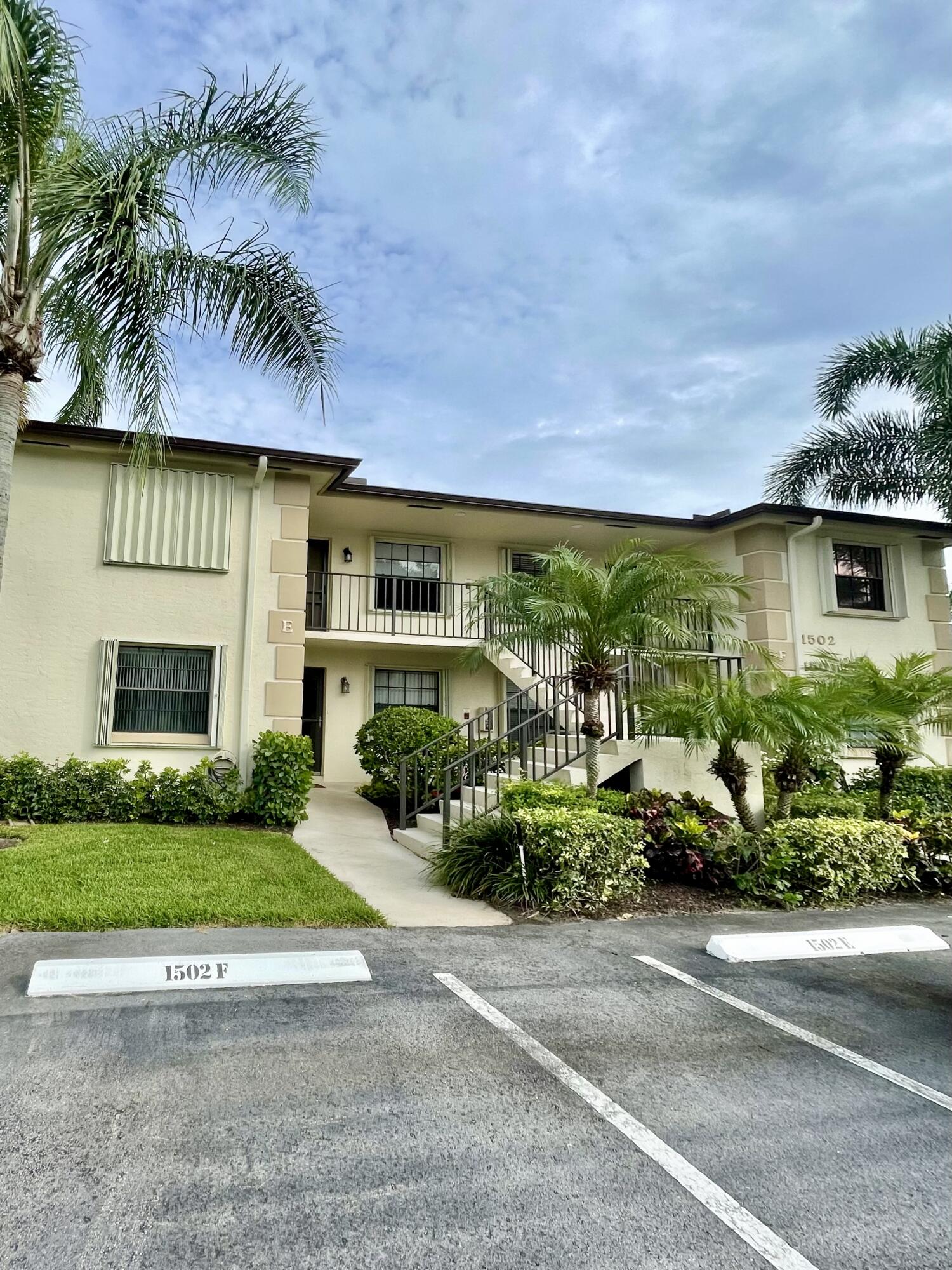 1501 Pinecrest Circle, Unit E Jupiter, FL 33458 - Photo 20 of 25 Full Hurricane accordian shutters