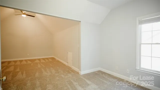 a kitchen with stainless steel appliances granite countertop a stove and a refrigerator