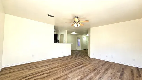 a kitchen with a sink and stainless steel appliances