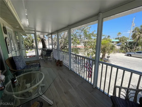 a view of a porch with furniture