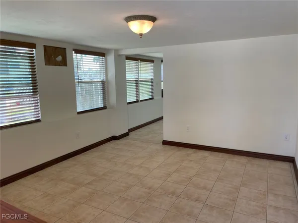 an empty room with windows