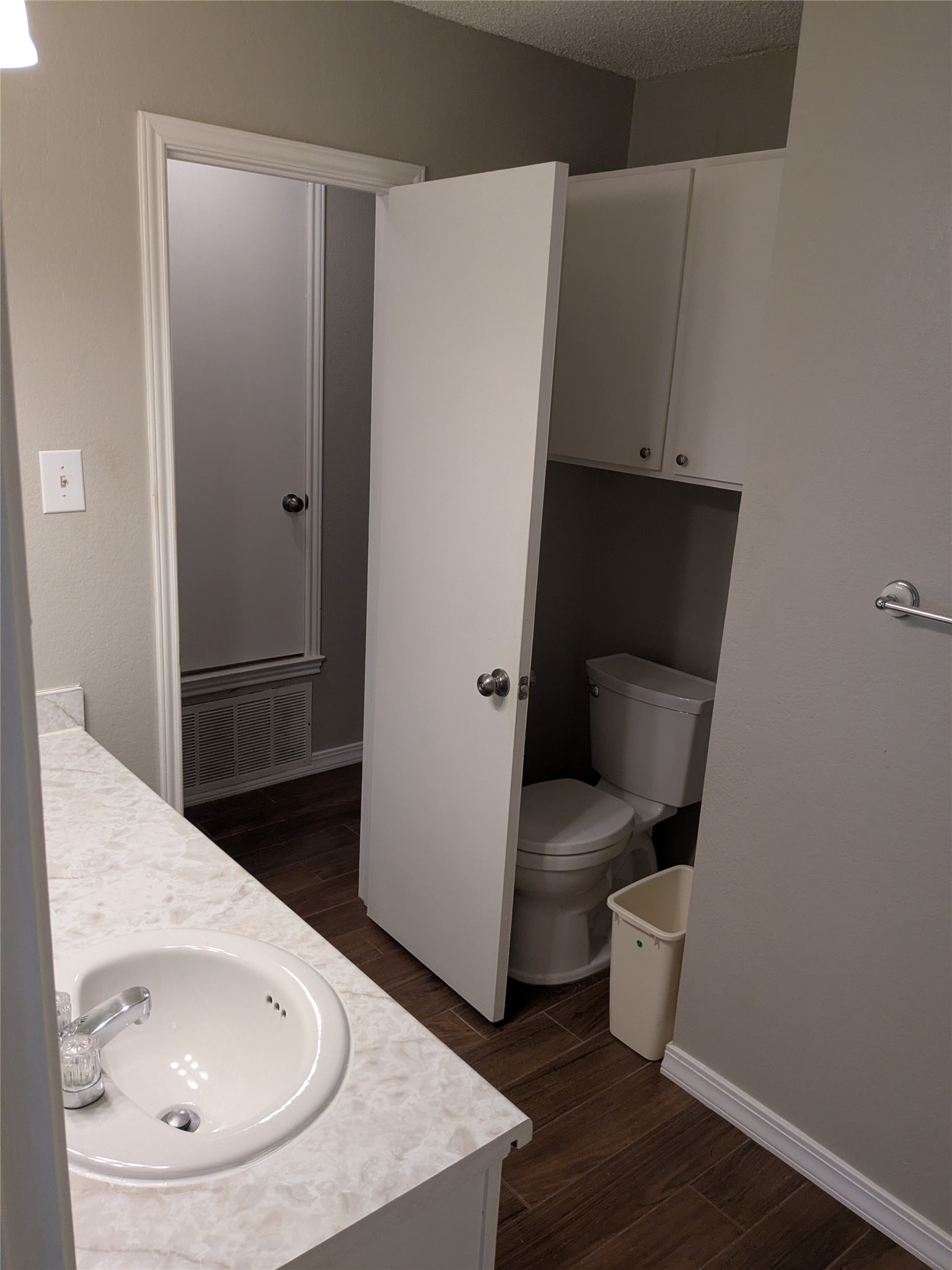 2502 Charla Circle Austin, TX 78728 - Photo 9 of 14 A well-appointed bath features a sleek single vanity and convenient water closet.