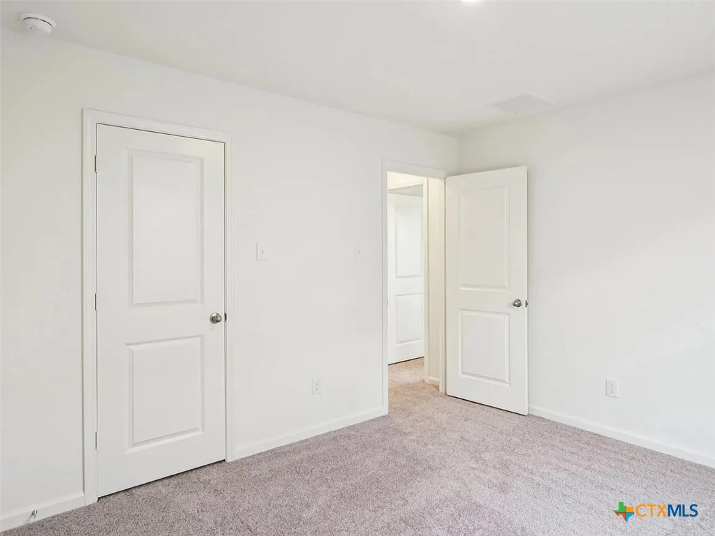 152 Mullen Taylor, TX 76574 - Photo 17 of 20 a view of an empty room
