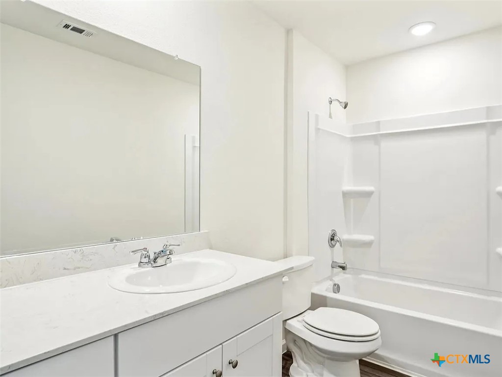 152 Mullen Taylor, TX 76574 - Photo 20 of 20 a bathroom with a sink toilet and shower