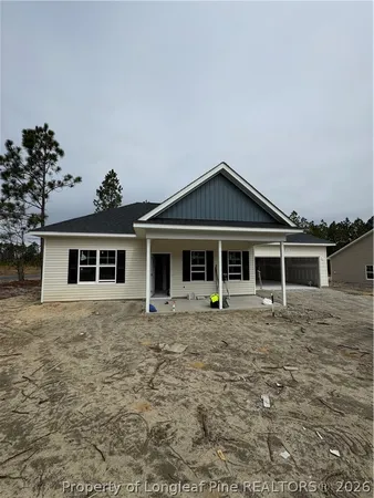 a front view of a house with yard