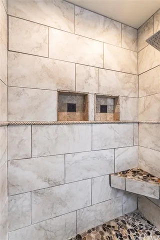 a bathroom with a sink and a shower
