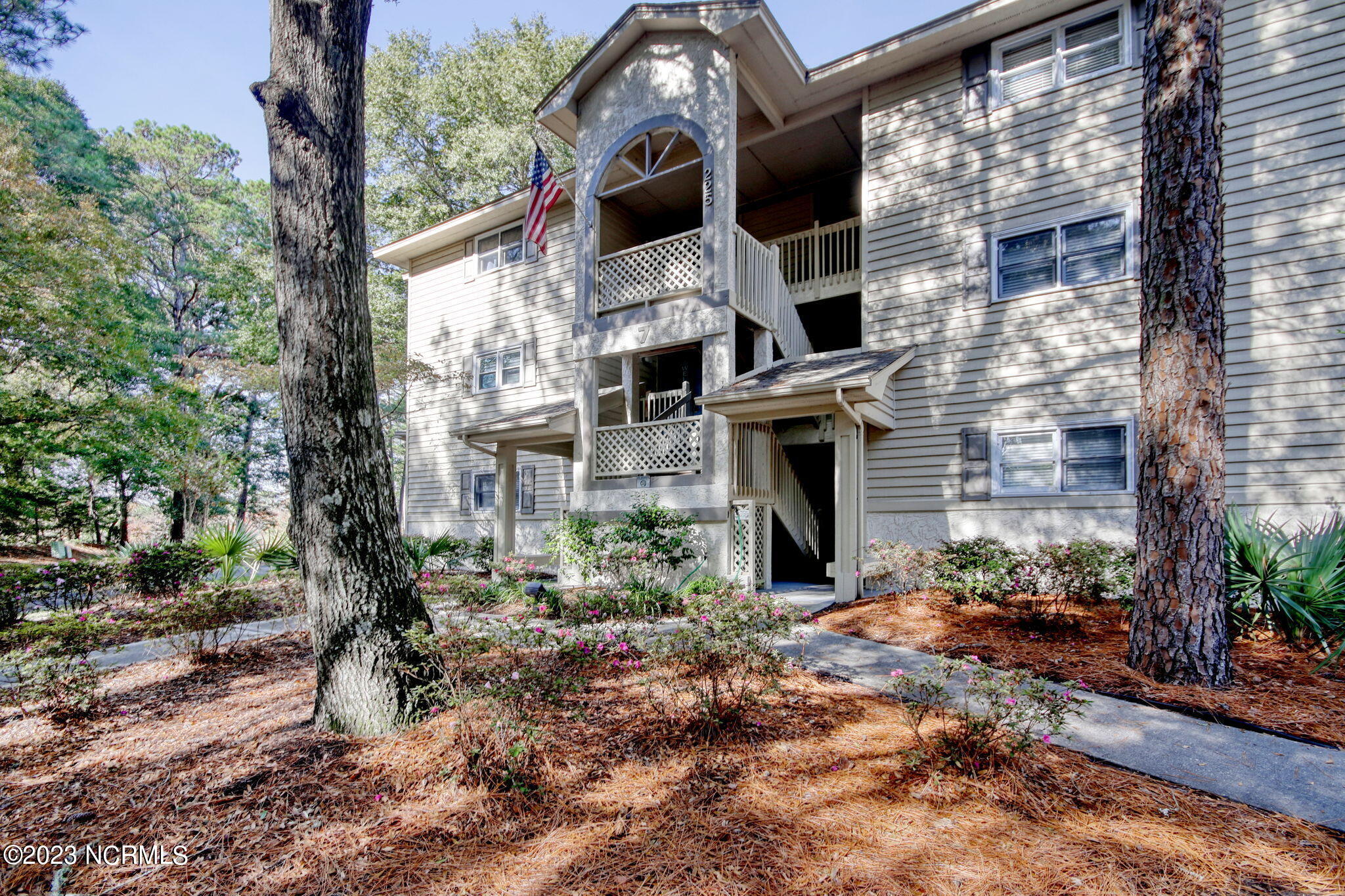 225 Clubhouse Road, Unit 706 Sunset Beach, NC 28468 - Photo 23 of 37 This condo building has easy wide stairs to climb. Great location within Sea Trail.
