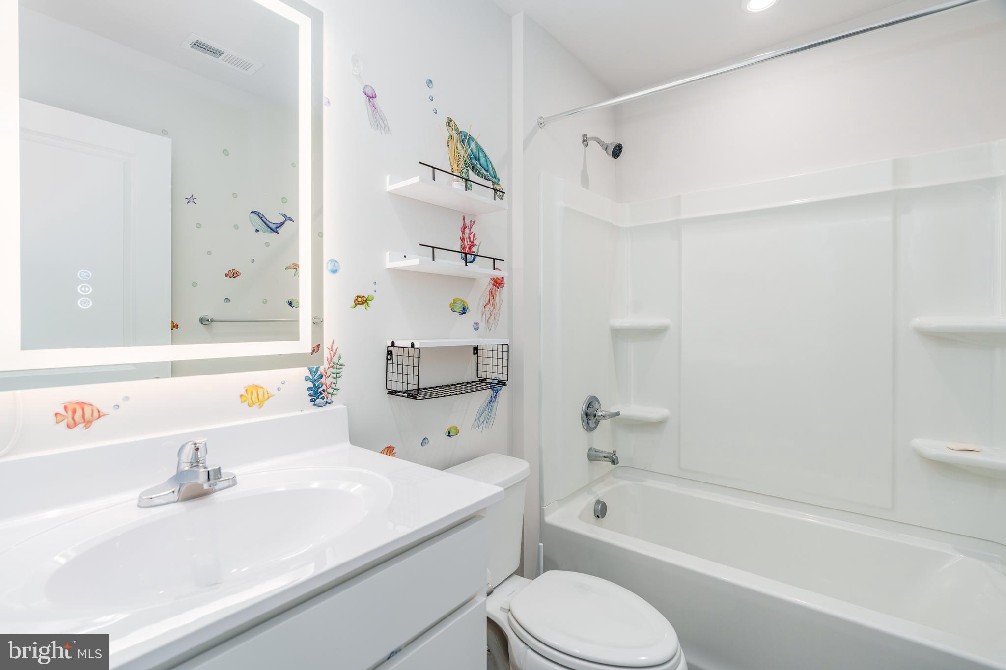 7 Olive Way Elkton, MD 21921 - Photo 12 of 21 a bathroom with a sink a toilet and a bathtub