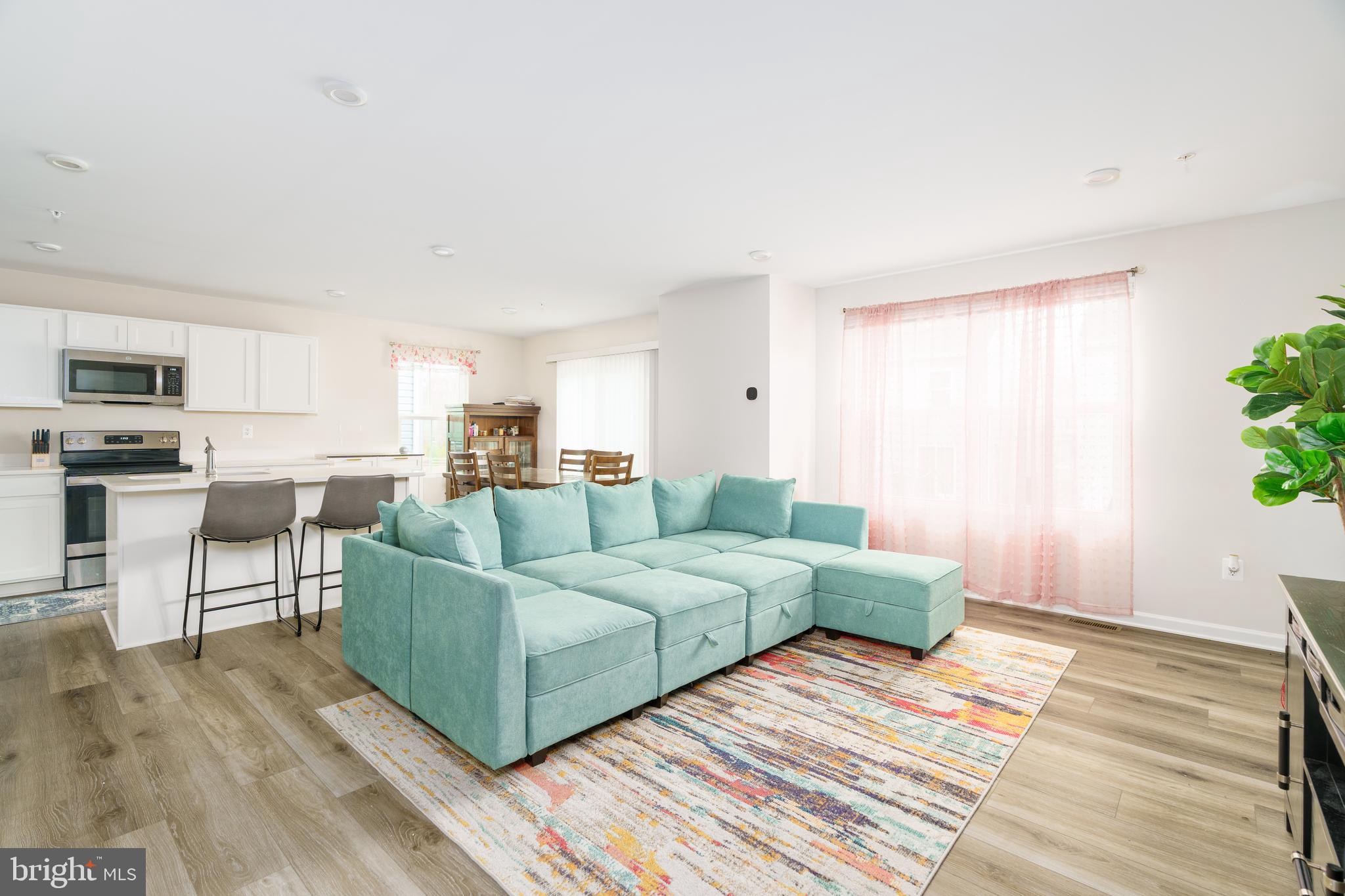 7 Olive Way Elkton, MD 21921 - Photo 2 of 21 a living room with furniture and a wooden floor