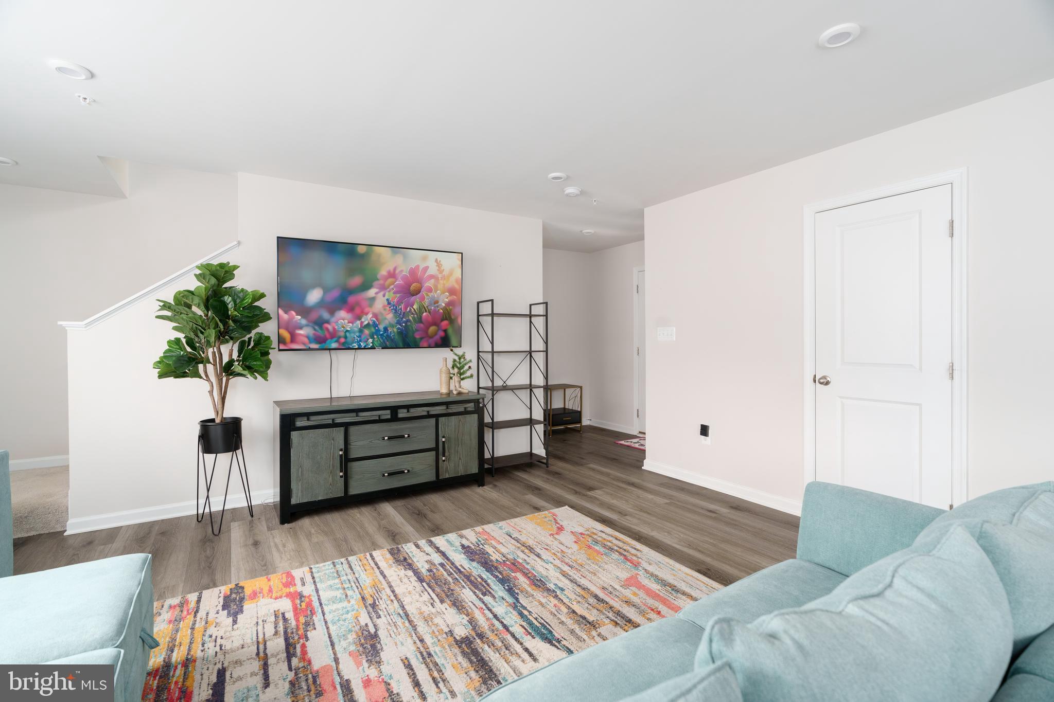 7 Olive Way Elkton, MD 21921 - Photo 4 of 21 a living room with furniture and a flat screen tv