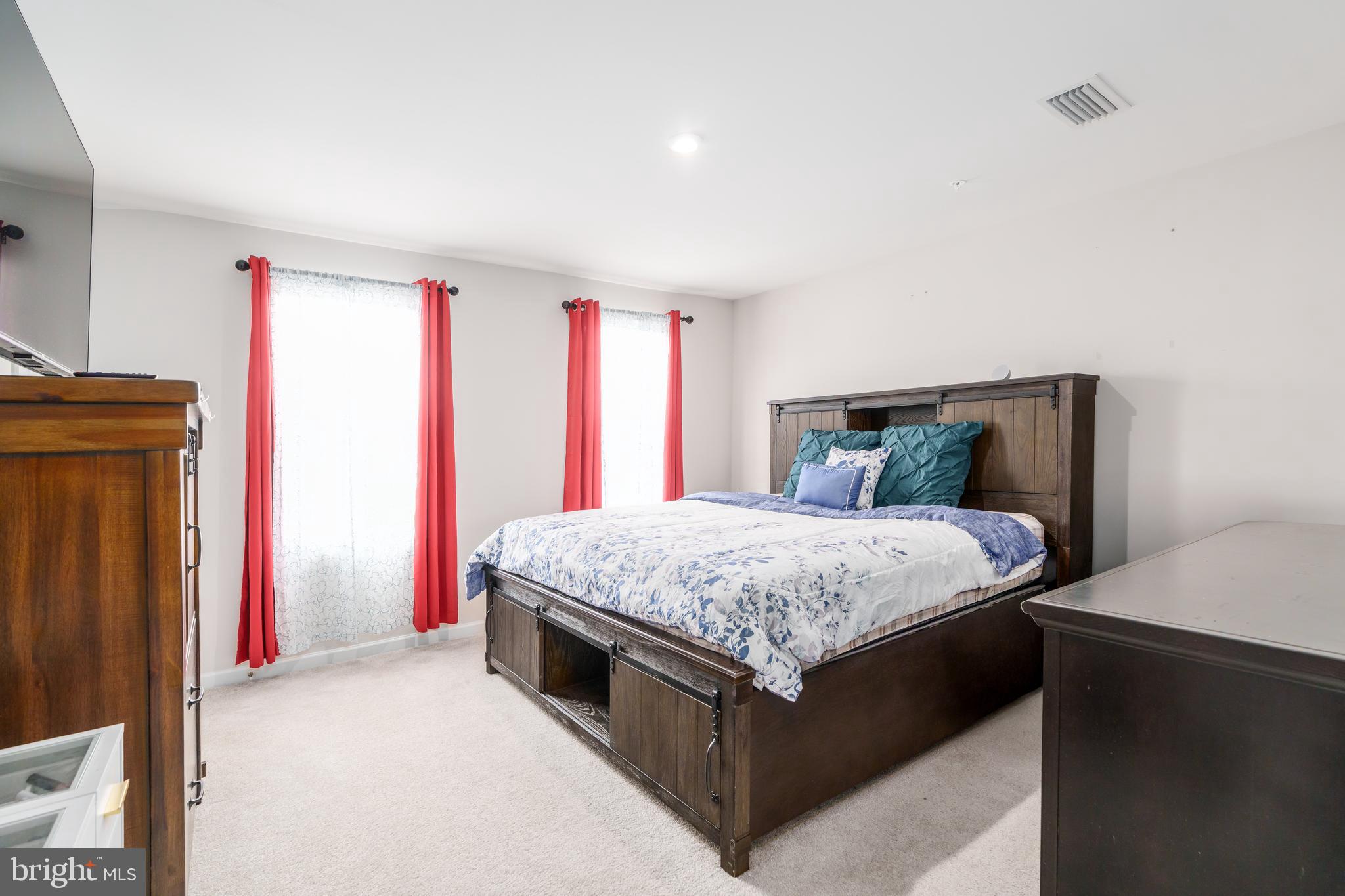 7 Olive Way Elkton, MD 21921 - Photo 7 of 21 a bedroom with a bed and a closet