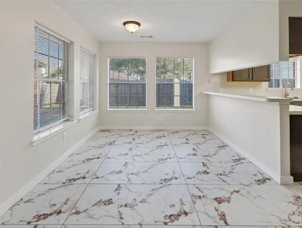 an empty room with windows