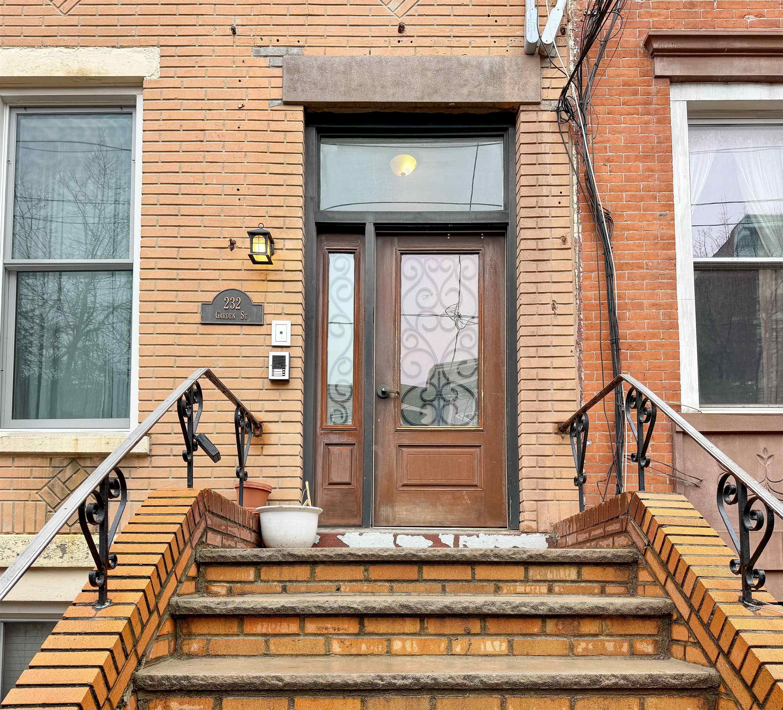 232 Garden Street, Unit 2 Hoboken, NJ 07030 - Photo 24 of 24 a view of house with wooden floor and windows