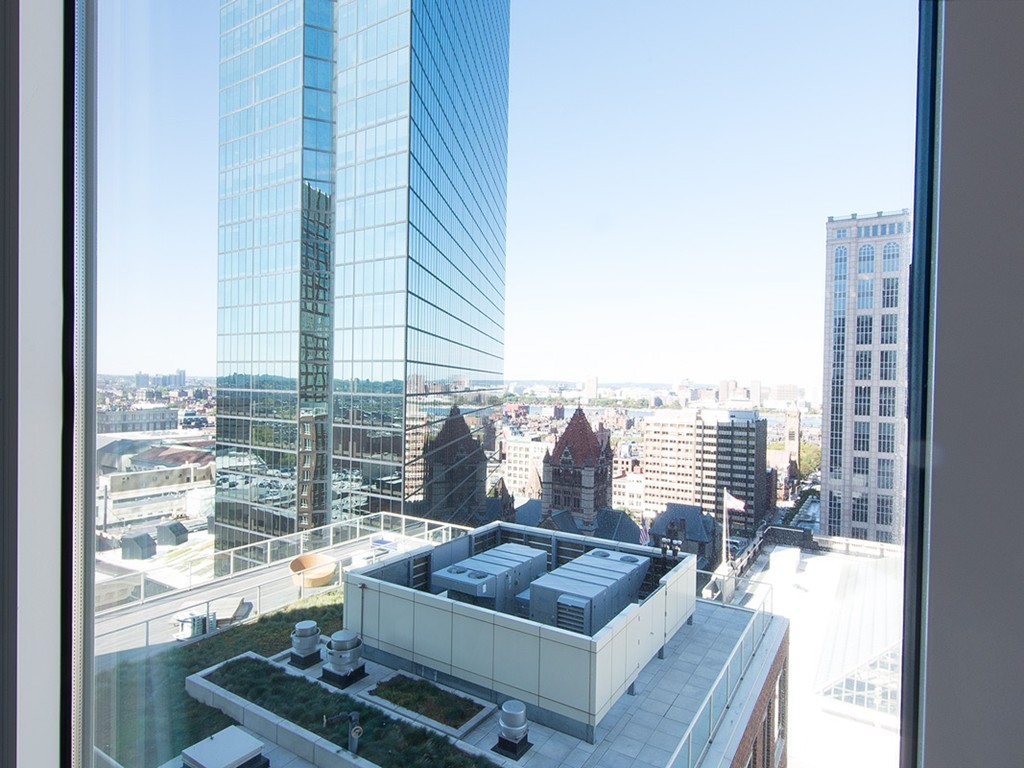 400 Stuart Street, Unit 21AA Boston, MA 02116 - Photo 13 of 22 a living room with furniture