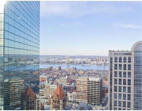 400 Stuart Street, Unit 21AA Boston, MA 02116 - Photo 14 of 22 a view of a city with tall buildings