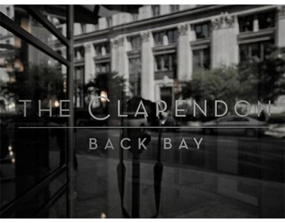 400 Stuart Street, Unit 21AA Boston, MA 02116 - Photo 22 of 22 a front view of a building with street