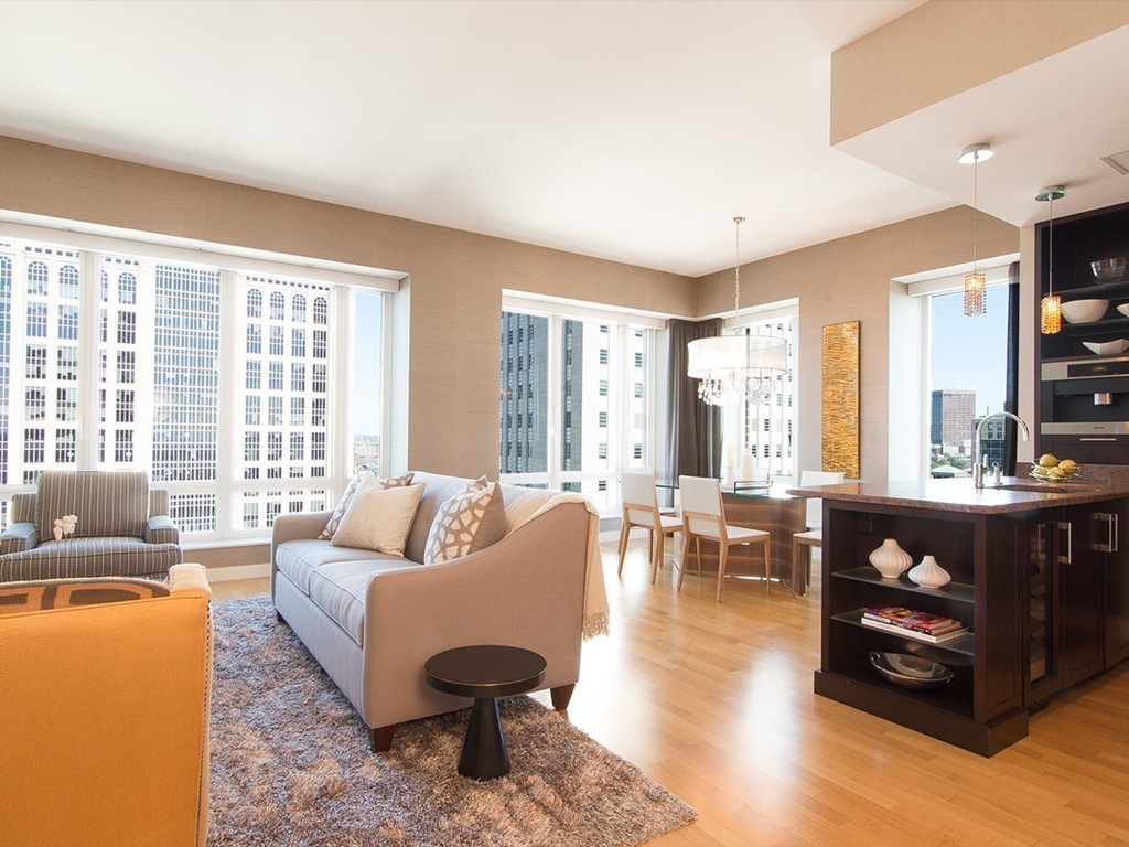 400 Stuart Street, Unit 21AA Boston, MA 02116 - Photo 4 of 22 a living room with furniture and a large window
